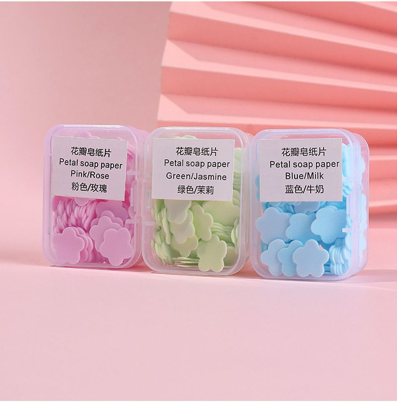 Comprimés de savon en gros en boîte pétale jetable antibactérien. pour étudiants hommes et femmes portent des mini comprimés de lavage des mains en papier savon